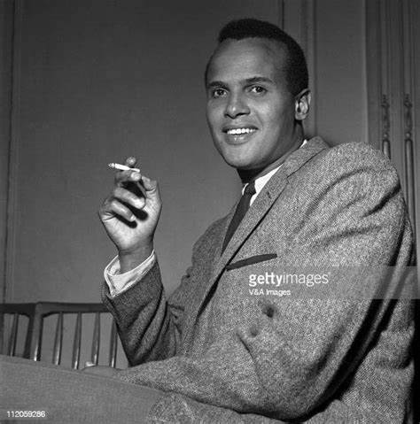 Young Harry Belafonte smoking a cigarette